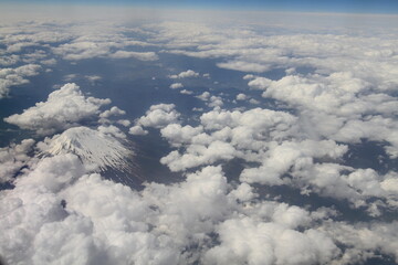 Fototapeta na wymiar aerial photo of Mount Fuji covered in snow.. Japan
