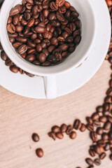 a cup of coffee Hot drink spilled grains photograph of the object