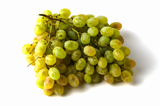 a brush of table white grapes on a white background