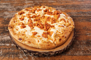 Homemade barbecue chicken pizza with onion and special sauce. Pizza with ingredients to cook it. Delicious Italian food