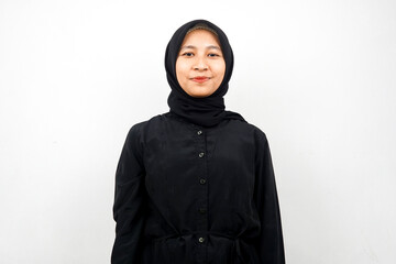 Naklejka na ściany i meble Beautiful young asian muslim woman smiling confidently isolated on white background