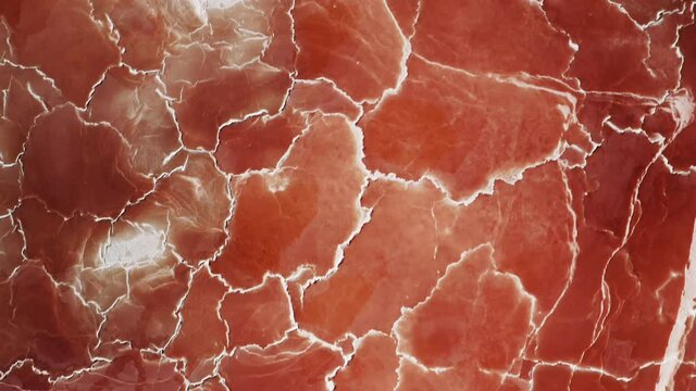 Amazing red pattern top down aerial background with white salt surface texture. Cinematic overhead orange nature texture looks like meat or prosciutto ham. Beautiful scenic natural background 4K USA