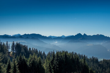 Naklejka na ściany i meble Landscape panoramic view of the swiss Alps, shot on the Moléson mountain,Fribourg, Switzerland