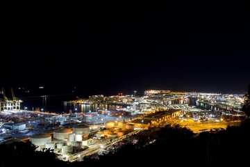 Industrial area of the port of Barcelona at night. View from Montjuic mountain.