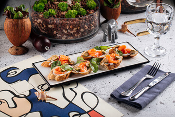 Gourmet salmon bruschetta appetizer dish on decorated background