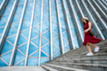 Asian woman in red dress at modern building, female girl with urban city lifestyle