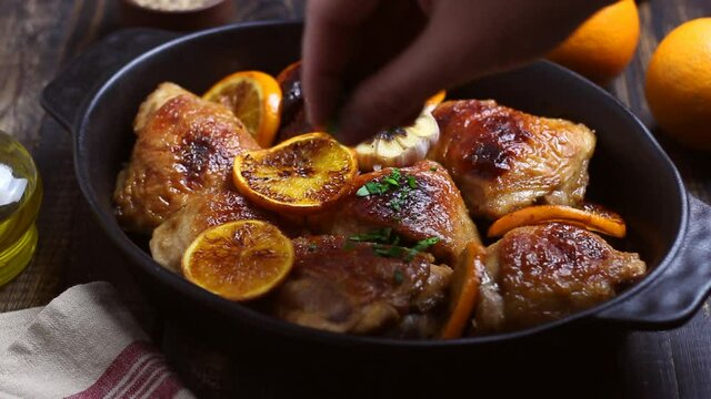 Baked chicken with oranges, garlic and mint. Recipe.