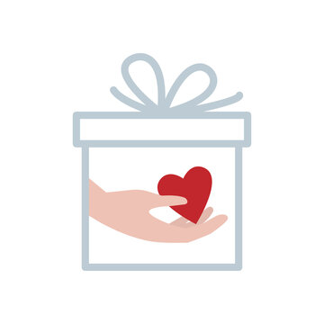 Giving a heart in a gift box. Concept of non-material gifts.