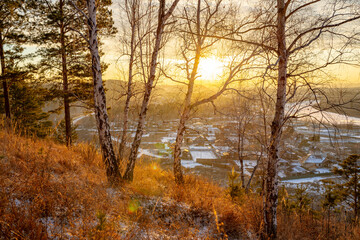 Sunset with beautiful views of the river and village 