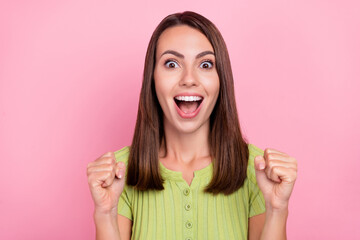 Photo of young excited girl excited rejoice victory scream success goal fan isolated over pink color background