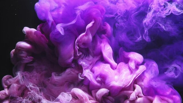 Ink water drop. Color splash. Glowing fluid motion. Pink purple blue smoke cloud animation effect for transition on black night abstract art background.