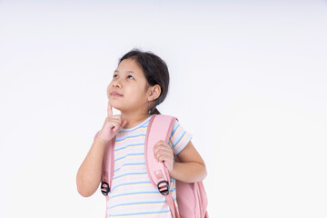 Back to school concept. Asian kids girl cute is standing thinking. Children with pink backpacks go to school on white background with copy space to get ready to study.