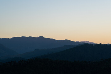 beautiful view of layers of mountains during sunset