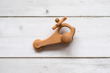 Old wooden toy plane on white background