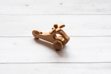 Old wooden toy plane on white background