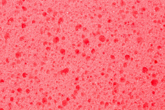 Extreme close up of a pink sponge texture background