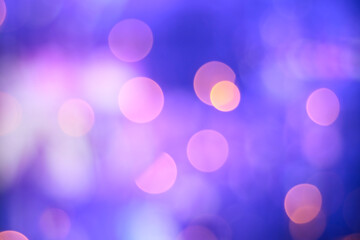 illuminated pink, blue and purple party lights bokeh background