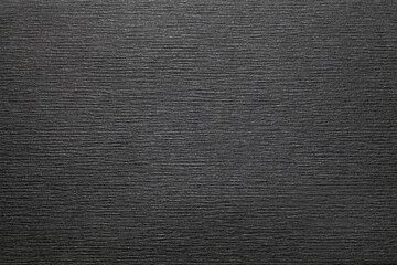 Sheet of black paper texture background