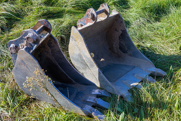 Bucket, excavator spare part. Close-up.