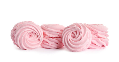 Many delicious pink zephyrs on white background