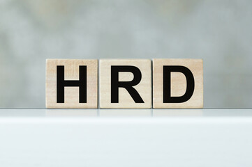 hrd word written on wood block. Faqs text on table, concept.
