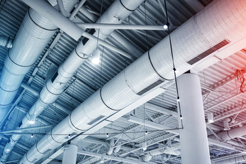 Ventilation pipes hvac duct tube hanging from ceiling store inside for conditioner air