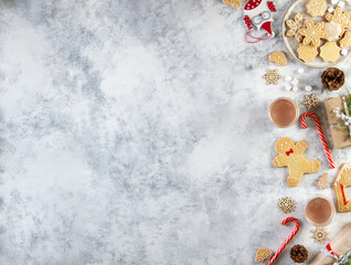 Concrete background with Christmas sweets and attributes
