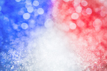 Fototapeta na wymiar 4th of July - USA Independence Day. Blurred view of glitters in colors of American national flag, bokeh effect