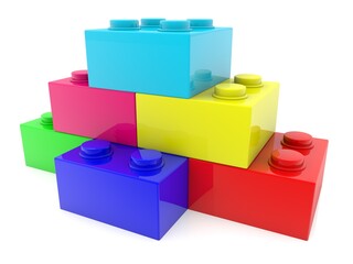 Colored toy bricks are connected to each other on a white background