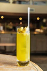 selective focus. author's cocktail for the restaurant menu in the interior. Sweet with caramel popcorn