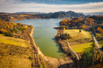 Beautiful landscape of Czorsztyn lake and Pieniny mountains in autumnal colors. Poland