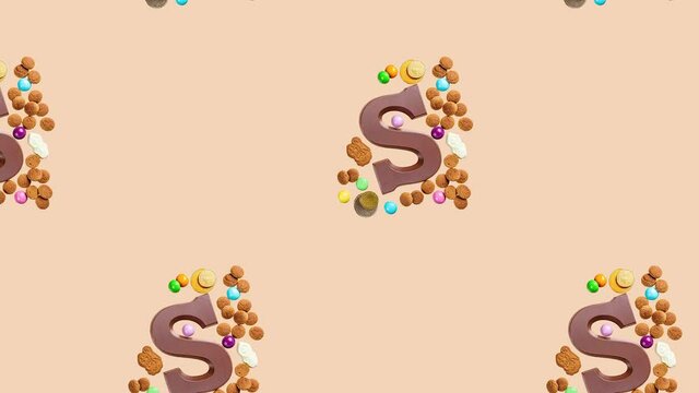 Festive collage with chocolate letter, kruidnoten cookies and traditional hollands sweets. Dutch holiday Sinterklaas background. FullHD video