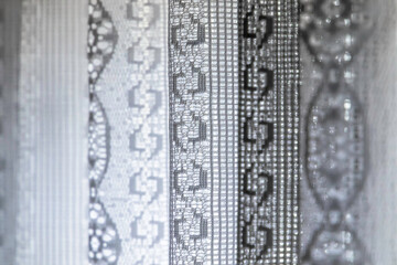 White knitted curtain pattern -Close up - Selective focus - Abstract background