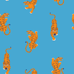 Tigers seamless pattern on blue background. - 468355794