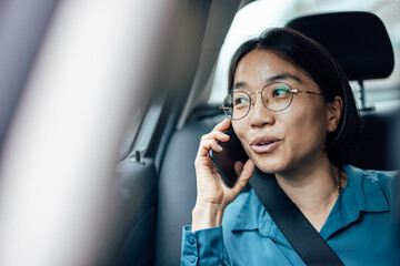 Close-up image of a manager talking on smart phone