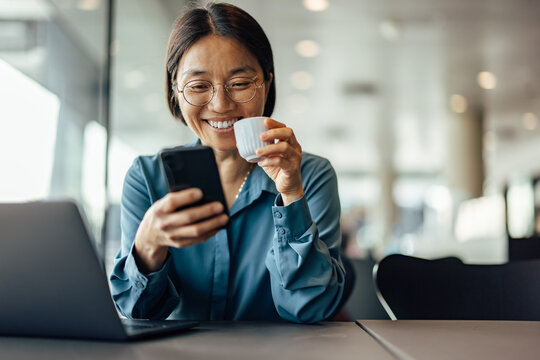 Cheerful Adult, Asian Woman, Taking A Short Break From Work