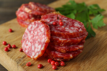 Сoncept of tasty food with salami sausage, close up