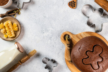 Christmas Baking background. Ingredients for cooking christmas baking on light background. Top view with copy space. Gingerbread cookies. Baking Ginger cookies. Raw dought for cookies