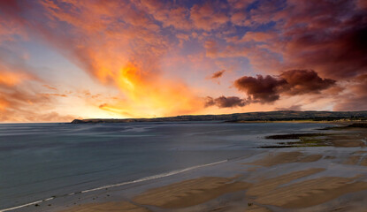 Fototapeta na wymiar Colorful cloudscape over Dungarvan Bay