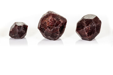 macro mineral stone  Garnet, on a white background