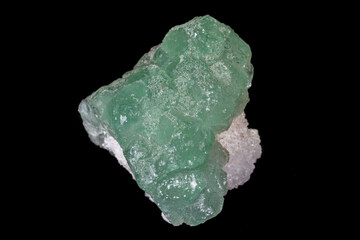 macro mineral fluorite stone on balck background