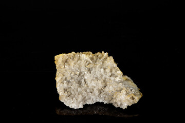 Macro mineral quartz stone on a black background