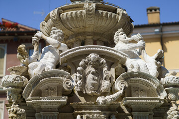 Fototapeta na wymiar Cesena: historic fountain in the castle square