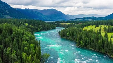 Aerial view of Kanas Lake and forest with mountain natural landscape in Xinjiang,China.Kanas Lake is the most beautiful lake in China.