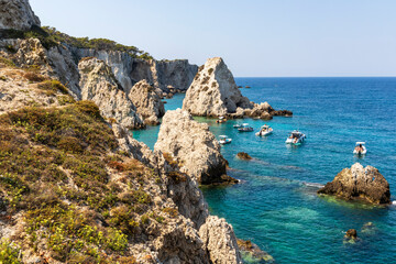 Fototapeta na wymiar Cliff, stacks and the bay of Pagliai of the island of San Domino of the archipelago of the Tremiti Islands, Puglia, Italy
