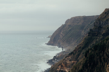 Cliffs in the atlantic ocean on a foggy day