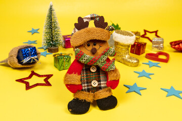 Fototapeta premium .Ornament Santa Claus boot on yellow background with christmas elements.