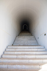 Fototapeta na wymiar Stairs in main tunnel to mausoleum of Petar II Petrovic Njegos on the top of mount Lovchen in Montenegro