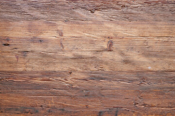 Textured walnut wooden table view from above