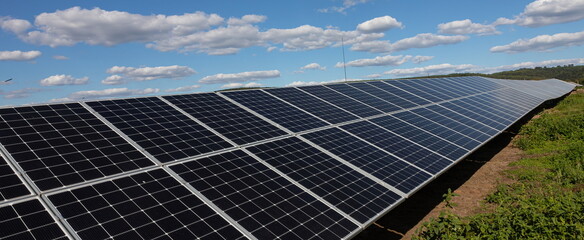 Solar panels in Large Photovoltaic power station, solar park, Renewable energy Sustainable energy,...